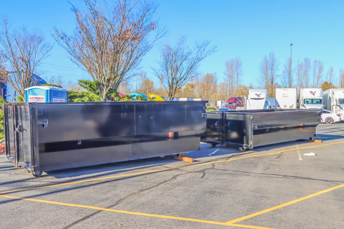 Professional dumpster rental service with roll-off container on residential driveway in Village of Oak Creek (Big Park)